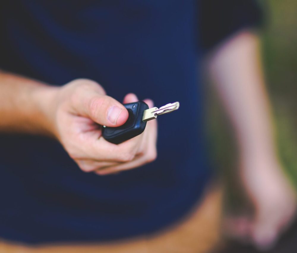 Automotive locksmith unlocking car door in Deer Park, TX